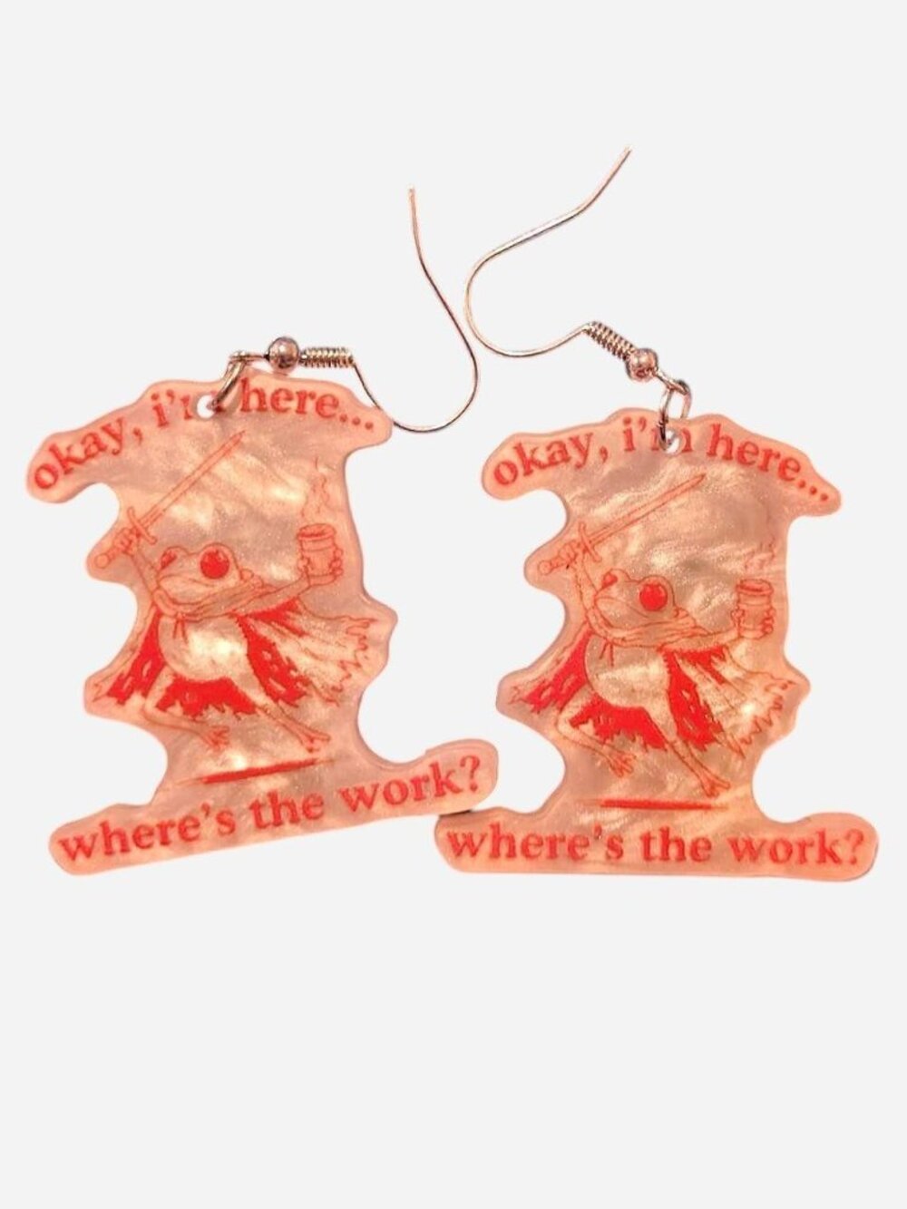 Red and clear acrylic earrings with red cartoon character graphic and text